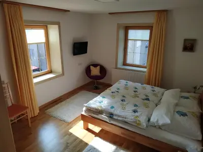 Ein Bett oder Betten in einem Zimmer der Unterkunft Ferienwohnung Sailer