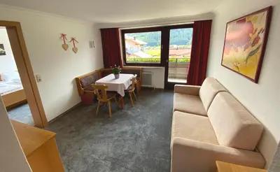 Ein Sitzbereich in der Unterkunft Pension Franglhof by Apartment Managers