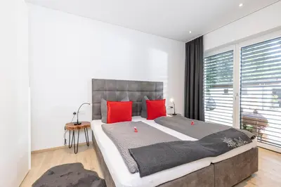 Ein Bett oder Betten in einem Zimmer der Unterkunft Apart Sabrina Fügen