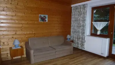 Ein Sitzbereich in der Unterkunft Apartement Hasenauer
