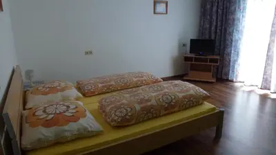Ein Bett oder Betten in einem Zimmer der Unterkunft Apartement Hasenauer