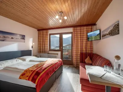 Ein Bett oder Betten in einem Zimmer der Unterkunft Landhaus Elfi
