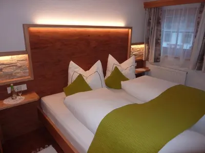 Ein Bett oder Betten in einem Zimmer der Unterkunft Appartements Stoffenhof