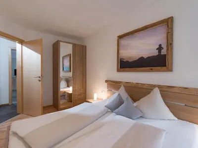 Ein Bett oder Betten in einem Zimmer der Unterkunft Ferienwohnung Eberharter