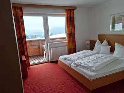 Ein Bett oder Betten in einem Zimmer der Unterkunft Gasthof und Hotel Rieder GmbH