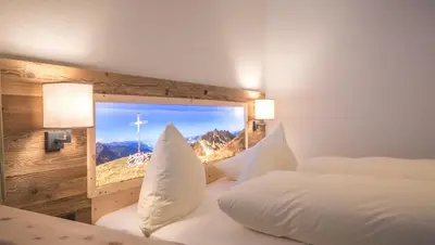 Ein Bett oder Betten in einem Zimmer der Unterkunft Hotel & Apart Central