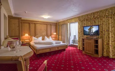 Ein Bett oder Betten in einem Zimmer der Unterkunft Mauracherhof