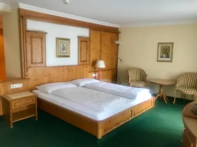 Ein Bett oder Betten in einem Zimmer der Unterkunft Mauracherhof