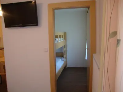 Ein Bett oder Betten in einem Zimmer der Unterkunft Gästehaus Schwoagerhof