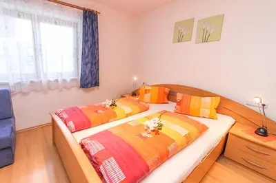 Ein Bett oder Betten in einem Zimmer der Unterkunft Ferienwohnung Biechl-Hauser Doris