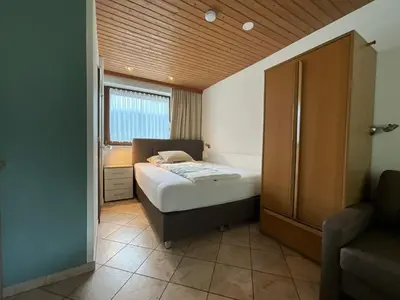 Ein Bett oder Betten in einem Zimmer der Unterkunft Appartement Fischer