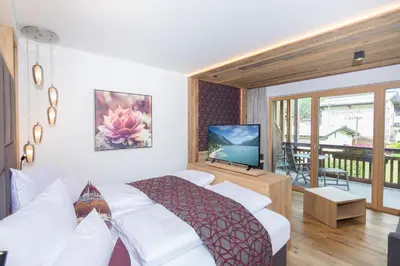 Ein Bett oder Betten in einem Zimmer der Unterkunft Wagner's Aparthotel