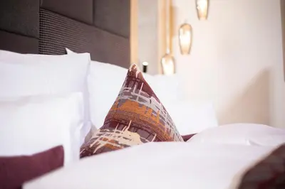 Ein Bett oder Betten in einem Zimmer der Unterkunft Wagner's Aparthotel