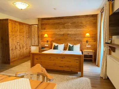Ein Bett oder Betten in einem Zimmer der Unterkunft Hotel Neuwirt