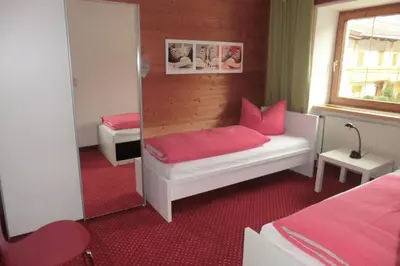 Ein Bett oder Betten in einem Zimmer der Unterkunft Ferienwohnungen Hell