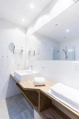 Ein Badezimmer in der Unterkunft Hotel Senningerbräu