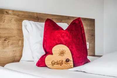 Ein Bett oder Betten in einem Zimmer der Unterkunft Au Pension