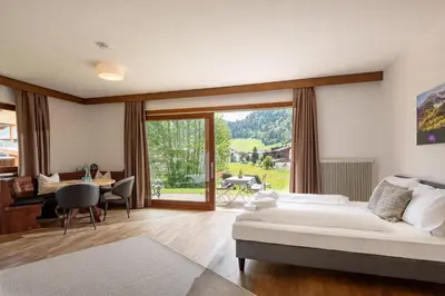 Ein Bett oder Betten in einem Zimmer der Unterkunft Au Pension