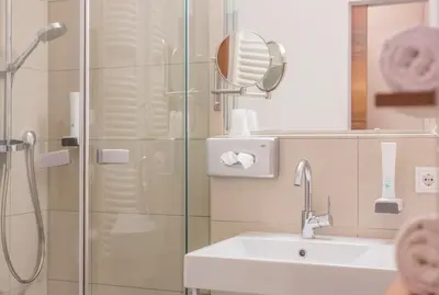 Ein Badezimmer in der Unterkunft Hotel Bacher Asitzstubn