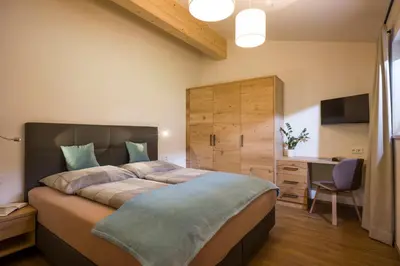 Ein Bett oder Betten in einem Zimmer der Unterkunft Beim Rohrer