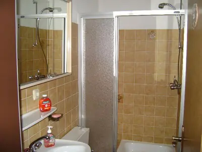 Ein Badezimmer in der Unterkunft Oostenrijk-walchsee-Hasewinkel