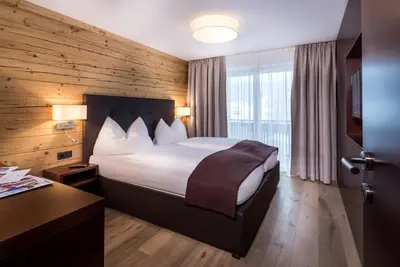 Ein Bett oder Betten in einem Zimmer der Unterkunft Hotel Kammerlander