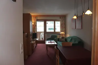 Ein Sitzbereich in der Unterkunft Ferienwohnungen am Dorfplatz