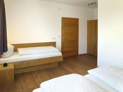 Ein Bett oder Betten in einem Zimmer der Unterkunft Apartment Anton-3 by Interhome