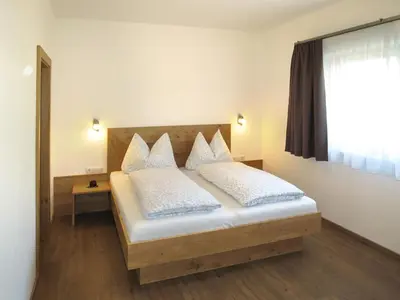 Ein Bett oder Betten in einem Zimmer der Unterkunft Apartment Anton-3 by Interhome