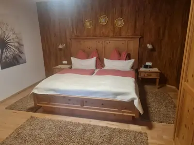 Ein Bett oder Betten in einem Zimmer der Unterkunft Andreas Apartment im Landhaus Moser