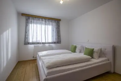 Ein Bett oder Betten in einem Zimmer der Unterkunft Ferienwohnung Hauser