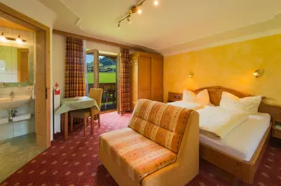 Ein Bett oder Betten in einem Zimmer der Unterkunft Pension Ederhof