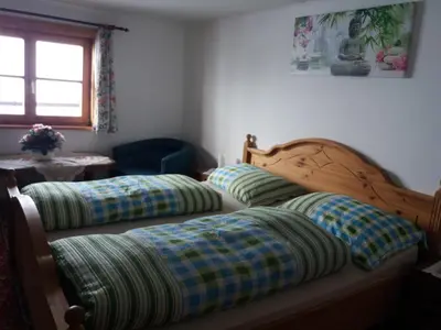 Ein Bett oder Betten in einem Zimmer der Unterkunft Talhof