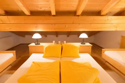 Ein Bett oder Betten in einem Zimmer der Unterkunft Aparthaus Sonnenhof