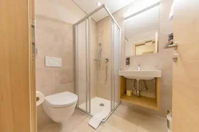 Ein Badezimmer in der Unterkunft KOSIS Sports Lifestyle Hotel