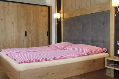 Ein Bett oder Betten in einem Zimmer der Unterkunft Hotel Sonne