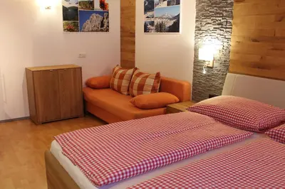Ein Bett oder Betten in einem Zimmer der Unterkunft Hotel Sonne