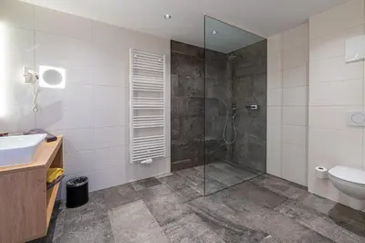 Ein Badezimmer in der Unterkunft Hotel Garni Romantik