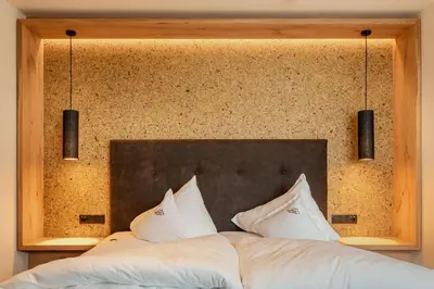 Ein Bett oder Betten in einem Zimmer der Unterkunft Kräuterhotel Hochzillertal