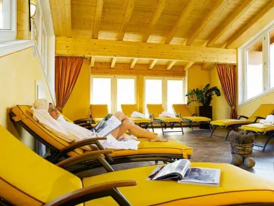 Ein Sitzbereich in der Unterkunft Apart Hotel Garni Strasser