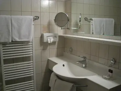 Ein Badezimmer in der Unterkunft Apart Hotel Garni Strasser