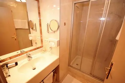 Ein Badezimmer in der Unterkunft Apart Hotel Garni Strasser