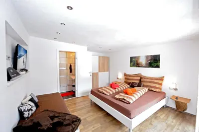 Ein Bett oder Betten in einem Zimmer der Unterkunft Apartment Rossbichl
