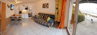 Ein Sitzbereich in der Unterkunft Apartment Rossbichl