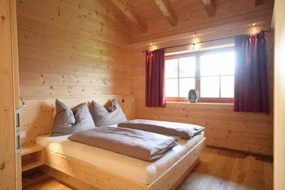 Ein Bett oder Betten in einem Zimmer der Unterkunft Almliesl MUEH-512