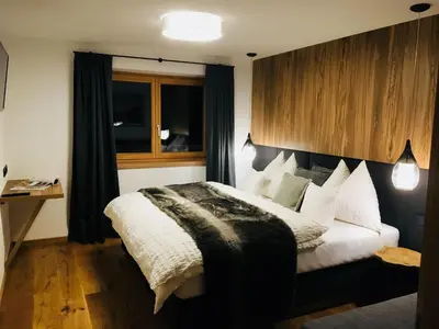 Ein Bett oder Betten in einem Zimmer der Unterkunft Ferienwohnung Lederer
