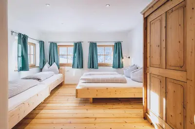 Ein Bett oder Betten in einem Zimmer der Unterkunft Appartement Adamhof Spielberg Leogang