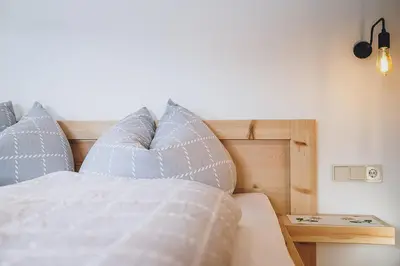 Ein Bett oder Betten in einem Zimmer der Unterkunft Appartement Adamhof Spielberg Leogang
