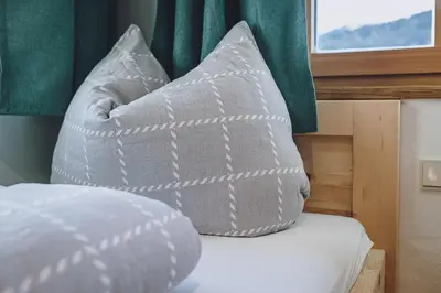 Ein Bett oder Betten in einem Zimmer der Unterkunft Appartement Adamhof Spielberg Leogang