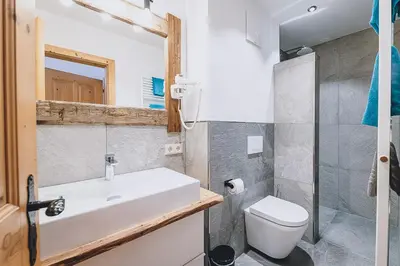 Ein Badezimmer in der Unterkunft Appartement Adamhof Spielberg Leogang